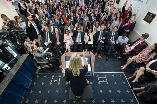 The White House is starting a new media policy that restricts wire services' access to the president