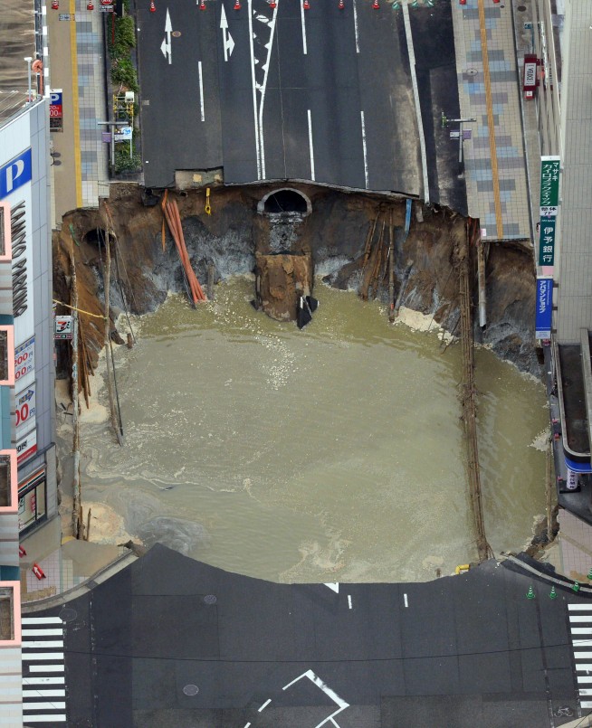 Parts of street collapse in southern Japan city; no injuries