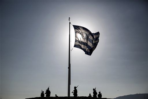 The latest on Greece: Greeks demonstrate in favor of euro