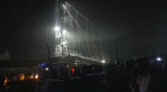 Suspension bridge collapse kills at least 132 in India
