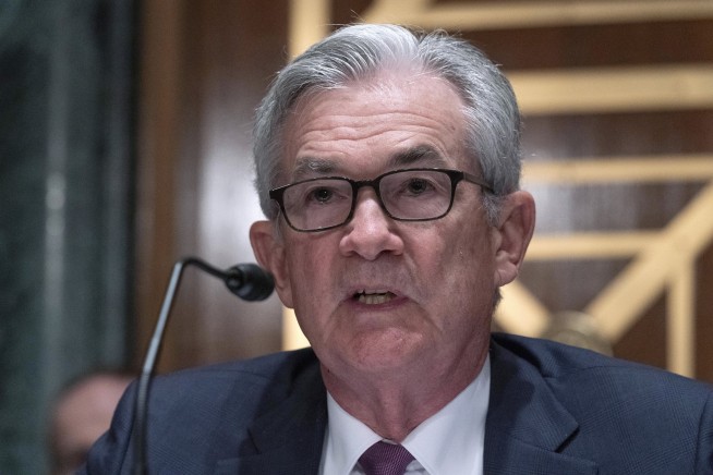 Fed notes improving economy, a step toward easing support