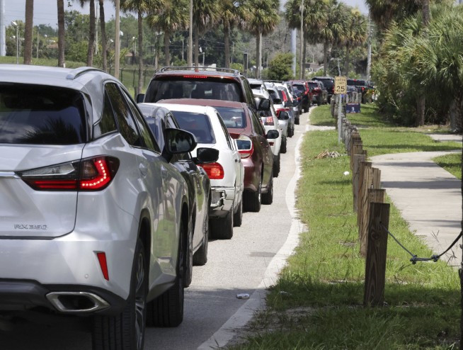 Florida virus cases soar, hospitals near last summer's peak