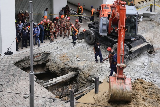 Woman from India disappears down a sinkhole in Malaysia's capital