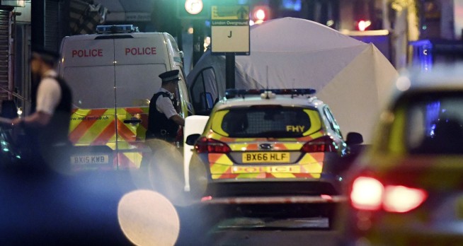 The Latest: Police: 1 suspect held in mosque attack