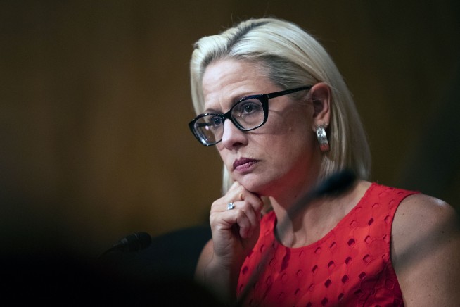 Jesse Jackson among 39 arrested at sit-in at Sinema's office