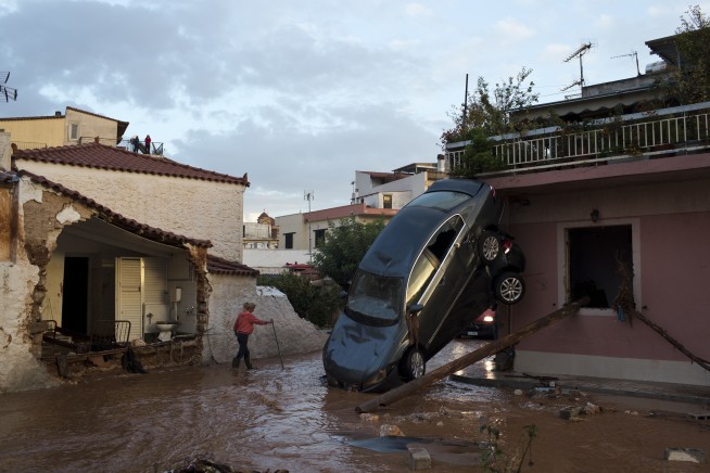 Greece in mourning as floods kill at least 14 near Athens