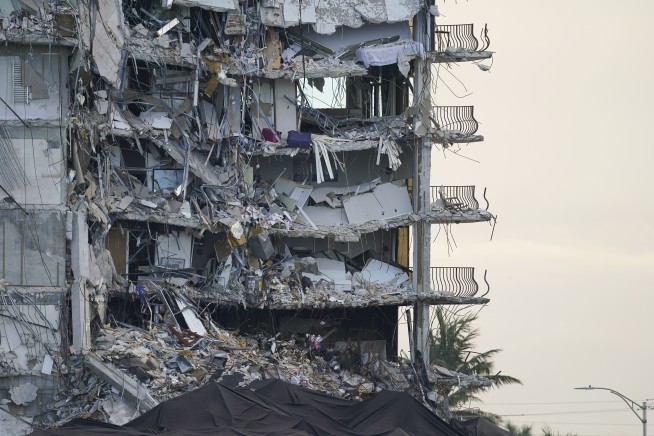 Investigators say tenant garage below collapsed Florida condo tower had many faulty support columns