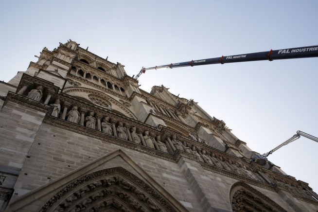 Fire-ravaged Notre Dame now stabilized, firefighters leave