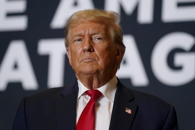 Trump sues ex-British spy over dossier containing 'shocking and scandalous claims'