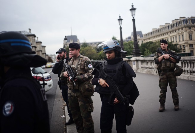 The Latest: Employee kills 4 officers at Paris police HQ
