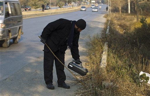 Pakistan's Musharraf no show in court; bomb found