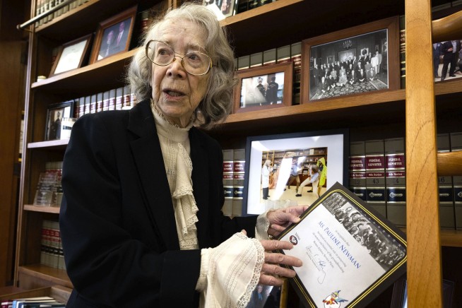A 96-year-old federal judge is barred from hearing cases in a bitter fight over her mental fitness
