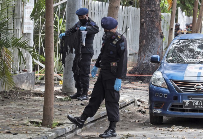 Newlywed militant suspects blamed in Indonesia church attack