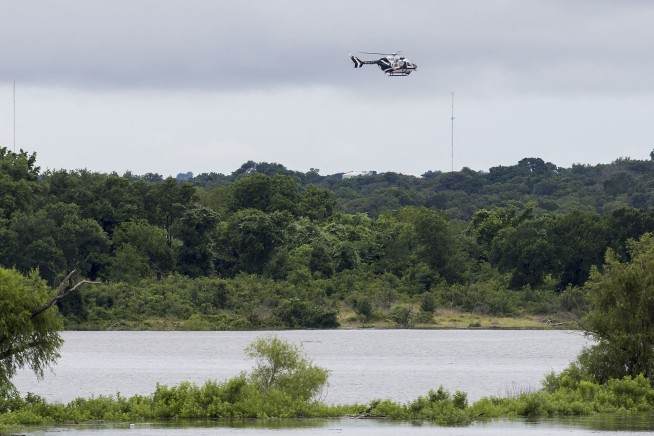 Crews search for 4 missing in Texas from flooded Army truck