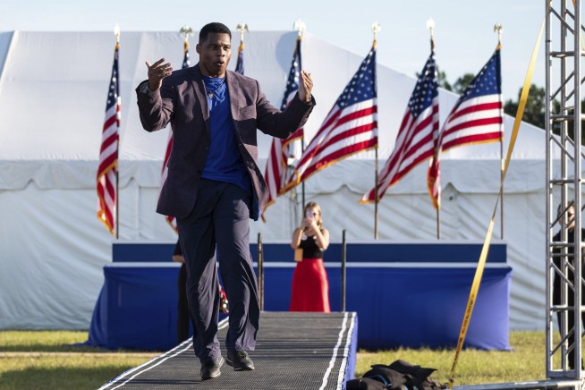 Senate hopeful Herschel Walker cancels event over swastika