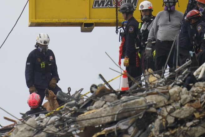 6 more bodies pulled from tower rubble in highest daily toll
