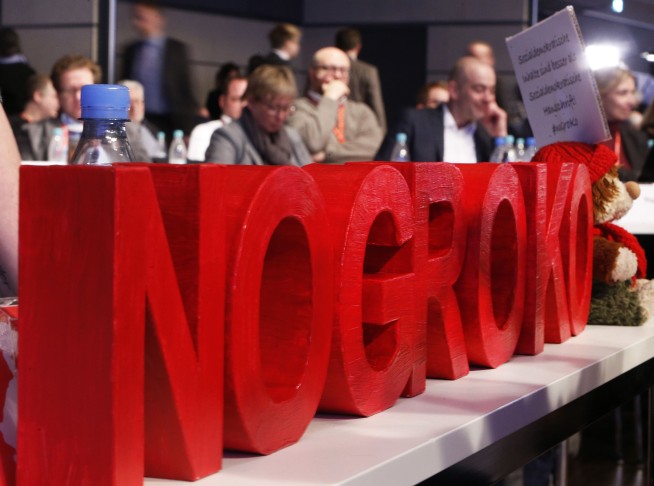 The Latest: German Social Dems vote to enter coalition talks