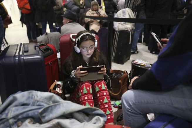 Gatwick flights operating after 2 arrested for using drone
