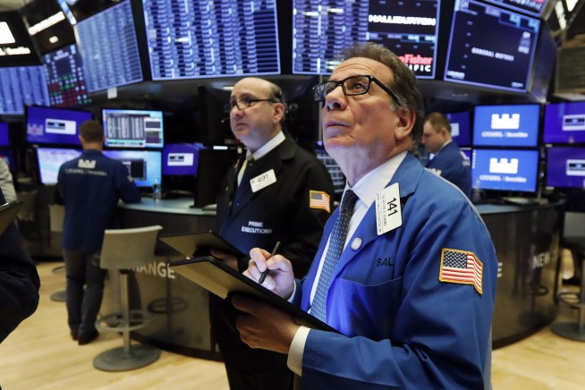 Stocks sink, bonds soar on fears virus will stunt economy