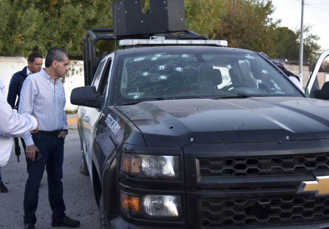 Death toll put at 20 for Mexico cartel attack near US border