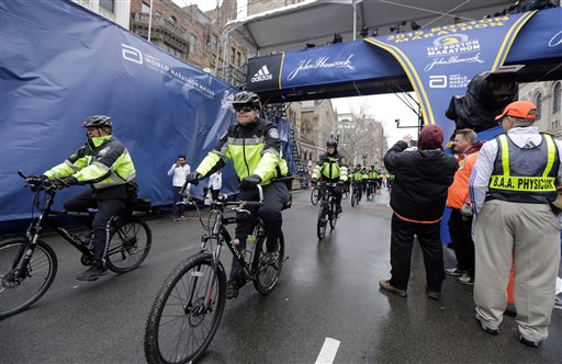 The Latest: Makau, fastest man in Boston field, drops out