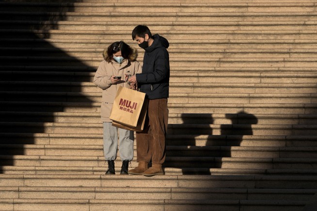 Chinese port city reports 41 virus cases, amid mass testing