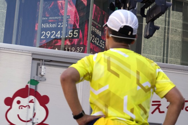 Stock market today: Asia shares mixed on holiday mode trade