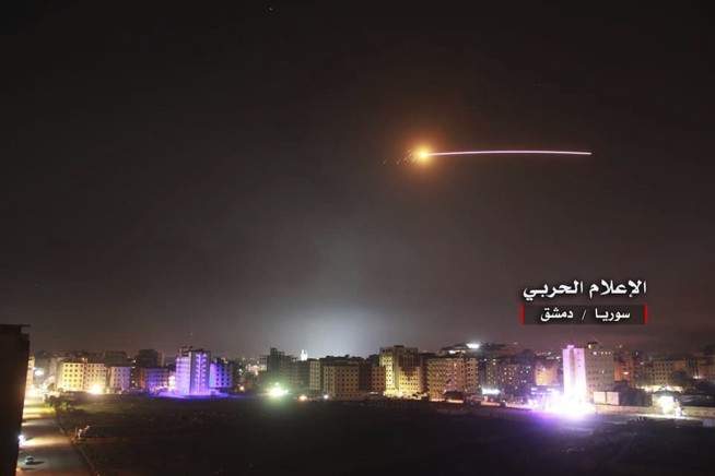 Israel hits dozens of Iranian targets in Syria after barrage