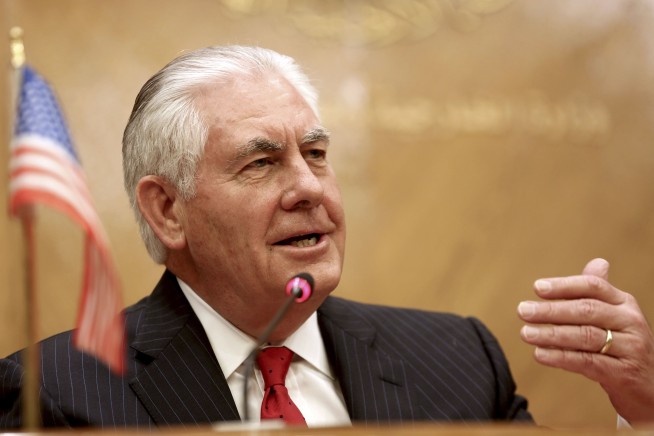 The Latest: Tillerson: Kurds never go heavy weapons from US