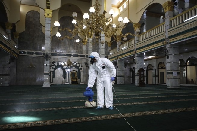 The Latest: Puerto Rico sees its first cases of coronavirus