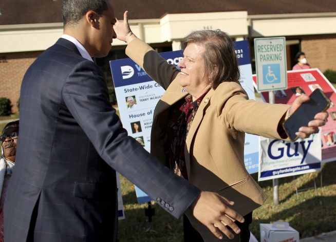 Tight Virginia governor race may be test of Biden popularity