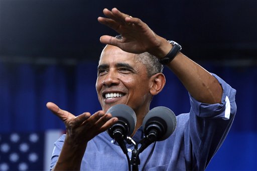 Obama: 'Revving' economy calls for higher wages