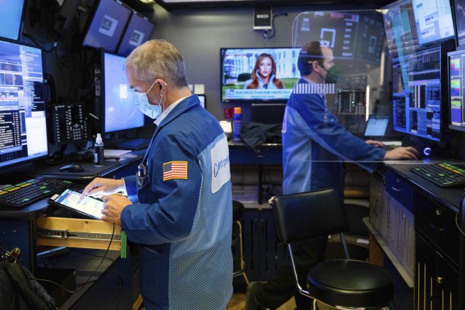 Wall Street's momentum swings back as stocks, yields tick up