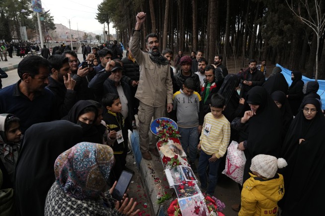Islamic State group claims responsibility for Iran suicide bombings killing at least 84 people