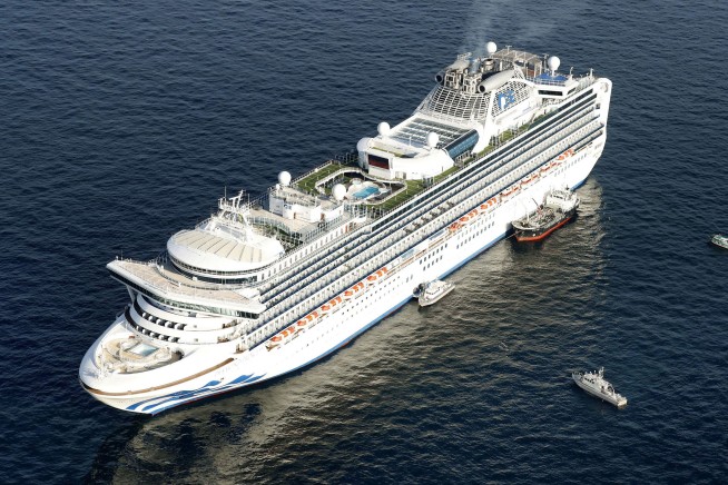 Japan quarantines cruise ship as toll of new virus grows