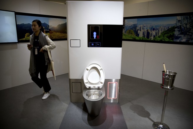 With poo on the podium, Bill Gates talks toilet technology