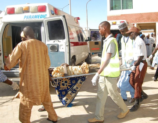 2 female bombers kill 58 in northeast Nigerian refugee camp