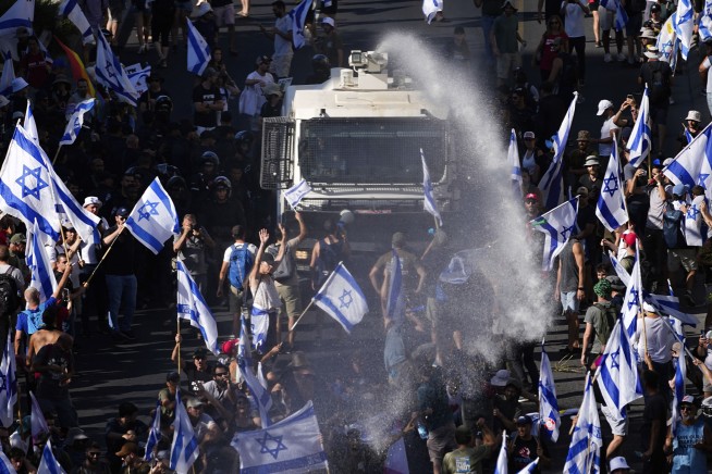 Israeli parliament takes first major step in Netanyahu's contentious overhaul, deepening divisions