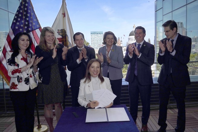 California records 1st woman to sign bill into state law