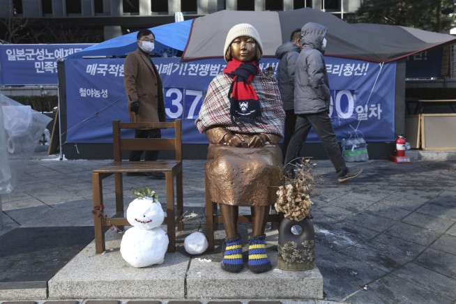 Seoul court orders Japan to compensate 12 Korean sex slaves