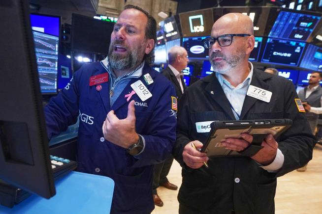 Big swings keep rocking Wall Street as US stocks drop sharply after erasing a morning surge