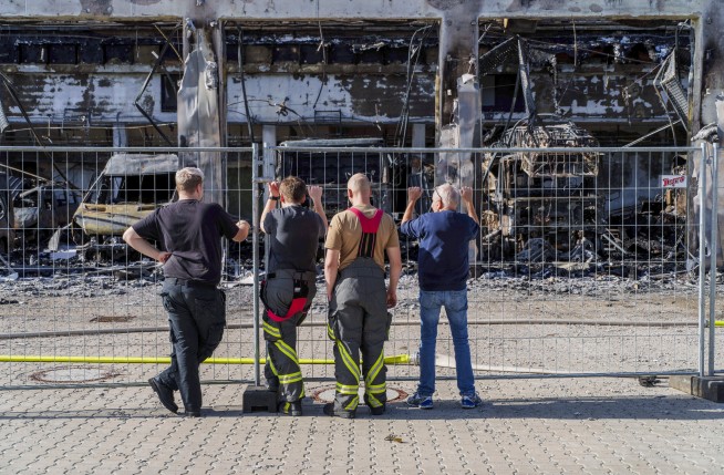 A blaze burns down a brand-new fire station in Germany that lacked fire alarms