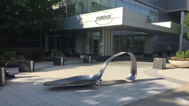 Drug spoon sculpture placed outside drugmaker headquarters
