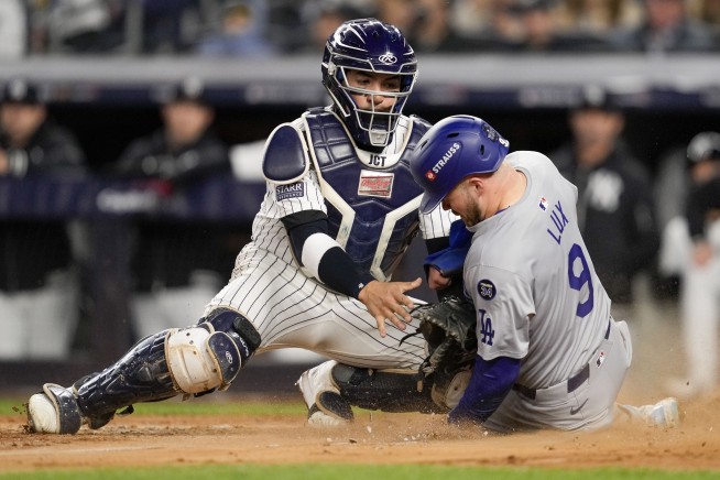 Freeman and Buehler lead Dodgers past slumping Yankees 4-2 for 3-0 advantage in World Series