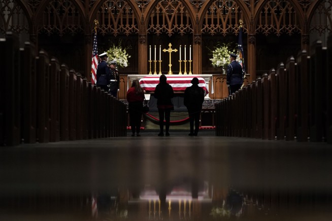 The Latest: Guests arrive at church for Bush service