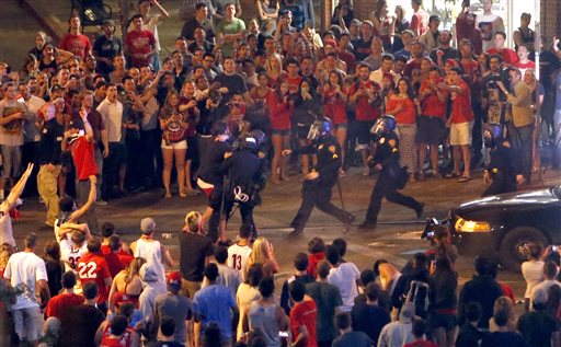 Police fire pepper spray at students after game