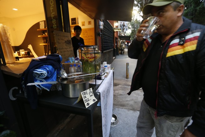 The Latest: Strong aftershock sways buildings in Mexico City