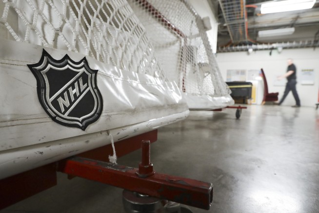 NHL, players reach tentative deal for 56-game season