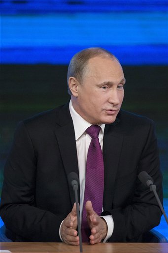 Putin accuses West of trying to sideline Russia