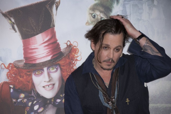 Actor Johnny Depp mocks his 'war on terrier' apology